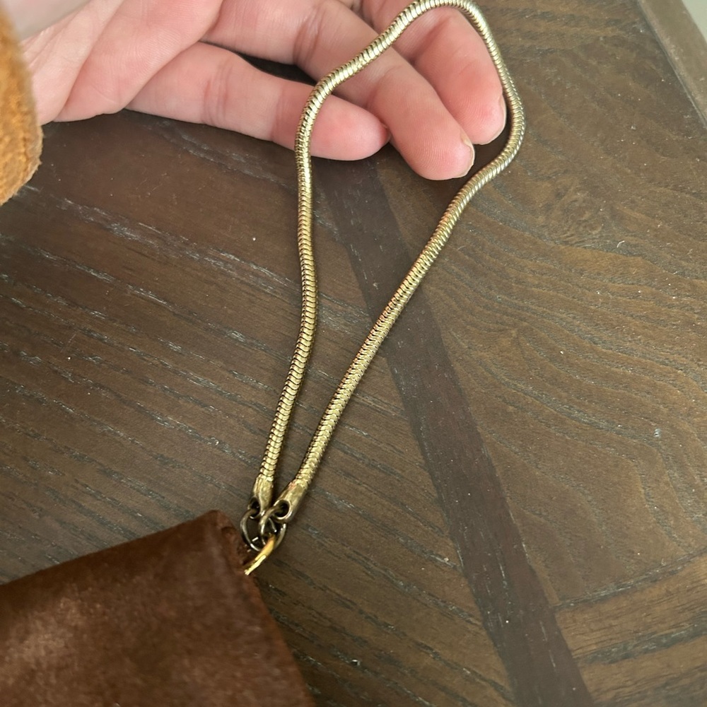 Brown leather clutch with minimalist gold-tone details and gold chain wristlet - Picture 14 of 14